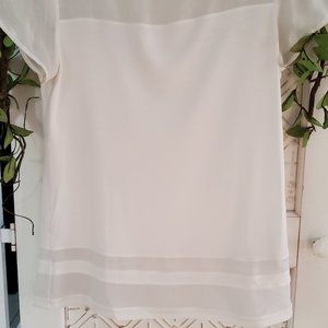 Ivory Blouse ( T ) with Sheer  material along neckline and bottom trim.